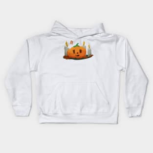 Halloween pumpkin with a face next to burning candles Kids Hoodie